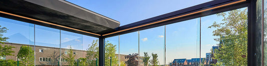 Keep the weather out under a pergola glass room