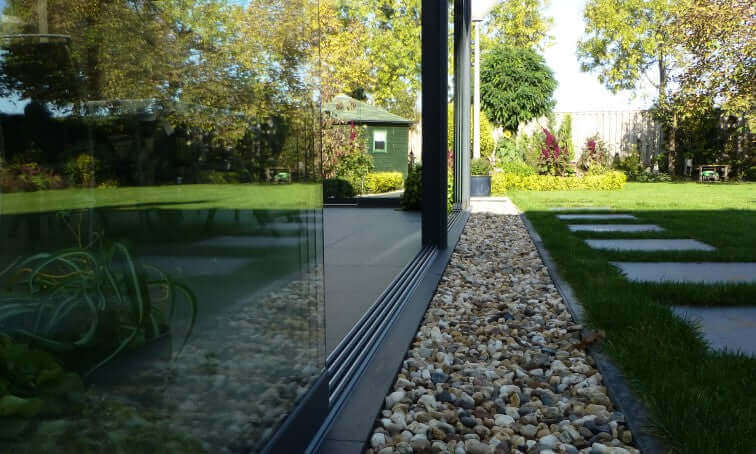 Fiano frameless sliding glass panels with flush fit tracking system