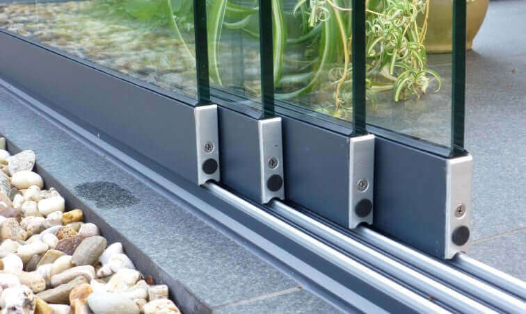 Fiano frameless sliding glass panels with flush track