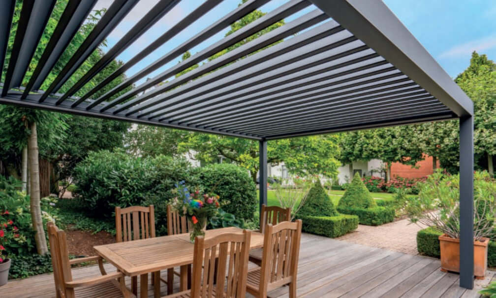 Pinela Louvered Roof Pergola free standing in the garden